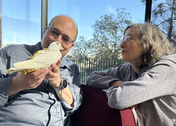 Craig & Mrs. Newmark chatting with blind Homer pigeons Nessie